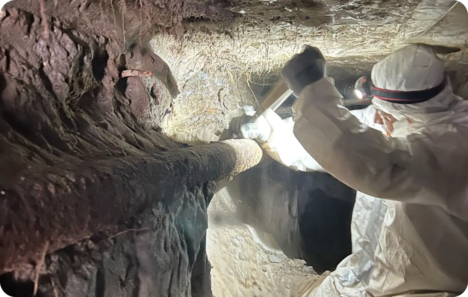 Technician marking inspection spot on floor